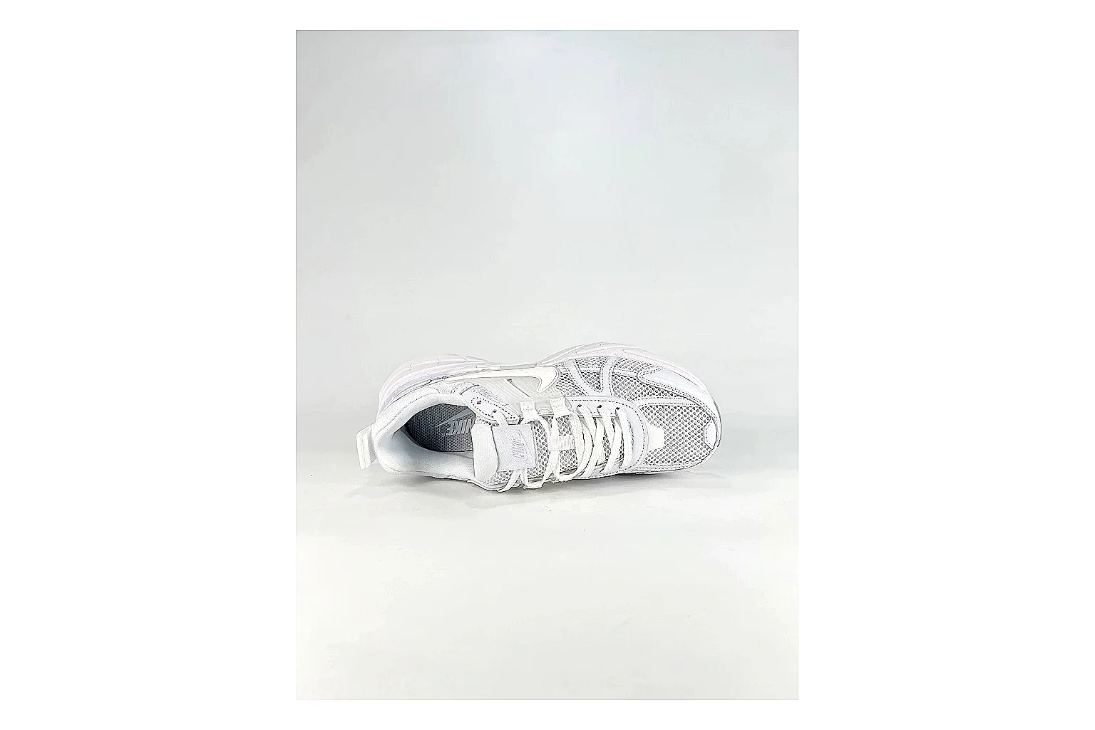Nike V2K Run White Sneakers spreadsheet record image with white retro runner sneakers with mesh-leather texture, side-profile shape, upper panel lines, and outsole detail thumbnail 2