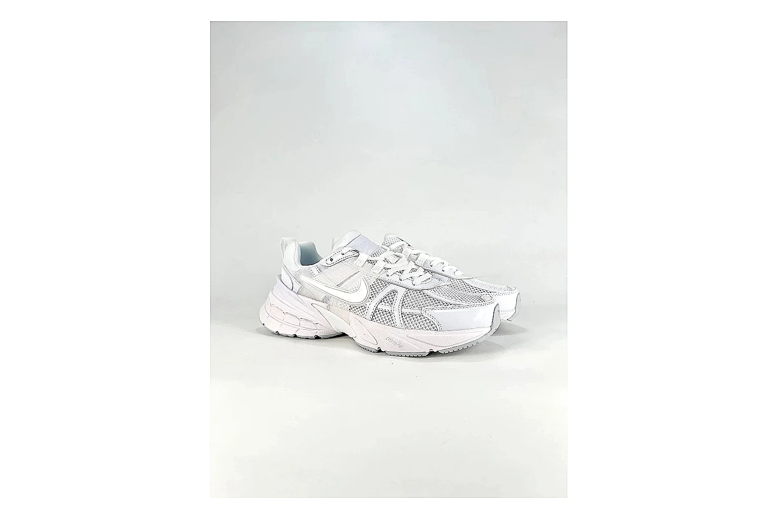 Nike V2K Run White Sneakers spreadsheet record image with white retro runner sneakers with mesh-leather texture, side-profile shape, upper panel lines, and outsole detail thumbnail 6