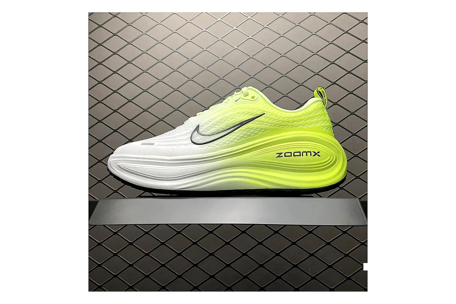 Nike Vomero Plus Volt White Sheetbase record image with white volt vomero plus runner with mixed upper and runner shape