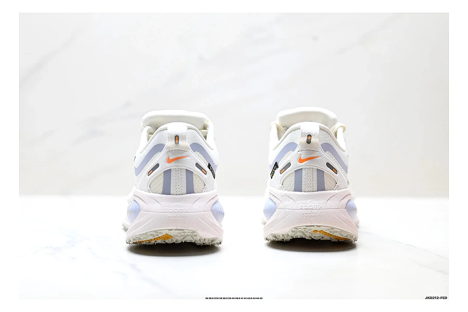 Nike Vomero White Orange spreadsheet record photo showing white mesh runner upper, orange accents, layered Vomero-style panels, and cushioned modern sole thumbnail 3