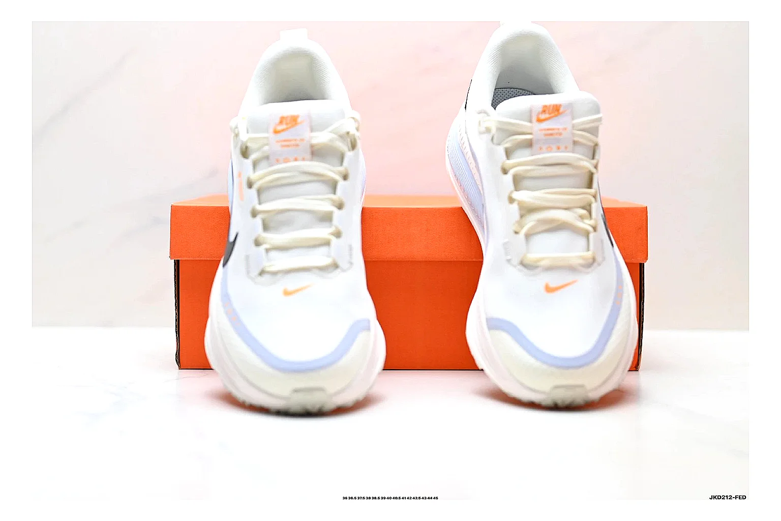Nike Vomero White Orange spreadsheet record photo showing white mesh runner upper, orange accents, layered Vomero-style panels, and cushioned modern sole thumbnail 5