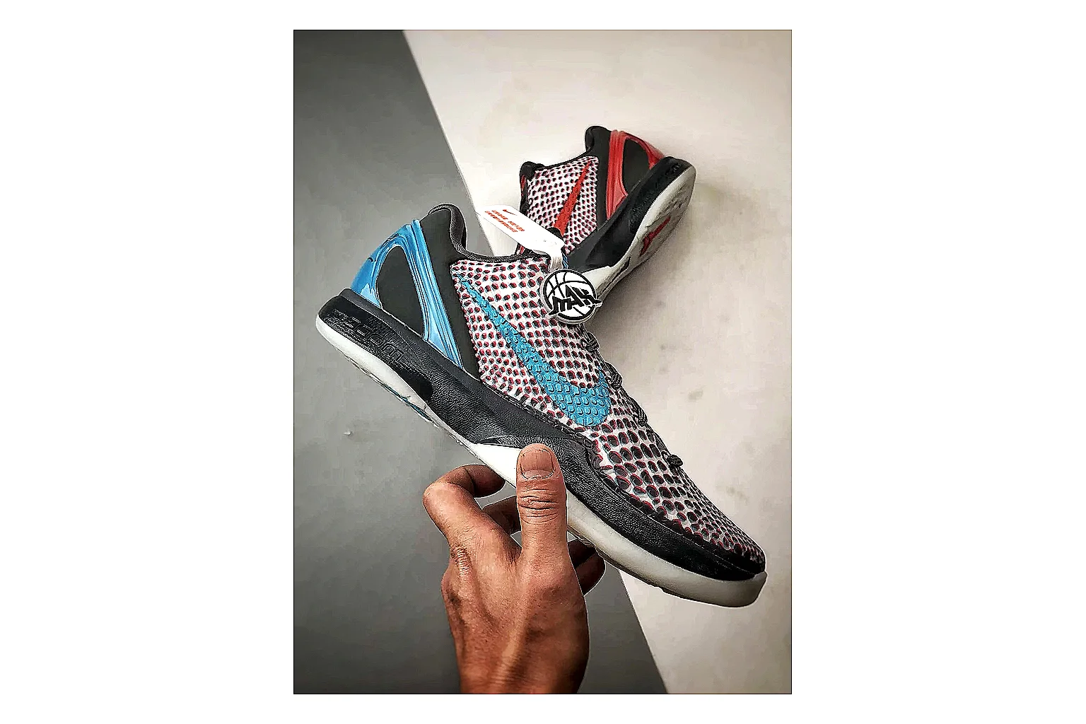 Nike Woven Runner Gray Teal spreadsheet record photo showing gray woven-mesh runner upper, teal accent details, modern runner shape, and cushioned sole