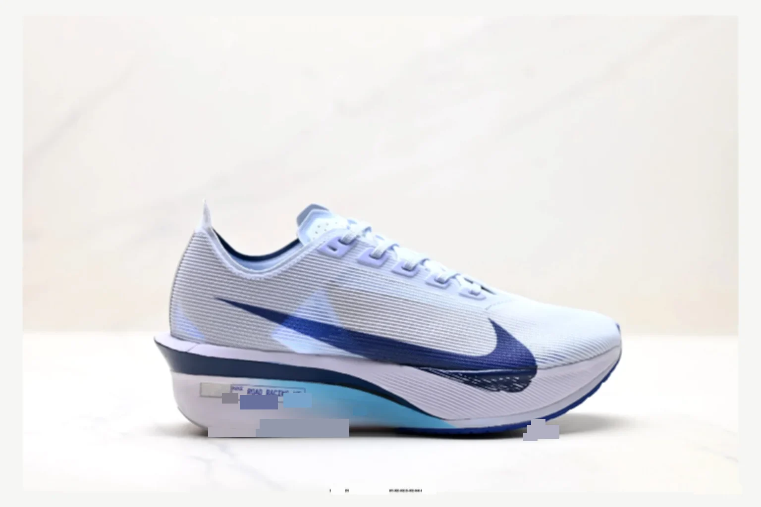 Nike ZoomX Vapor White Blue Runner spreadsheet record image SKU 1182167428
