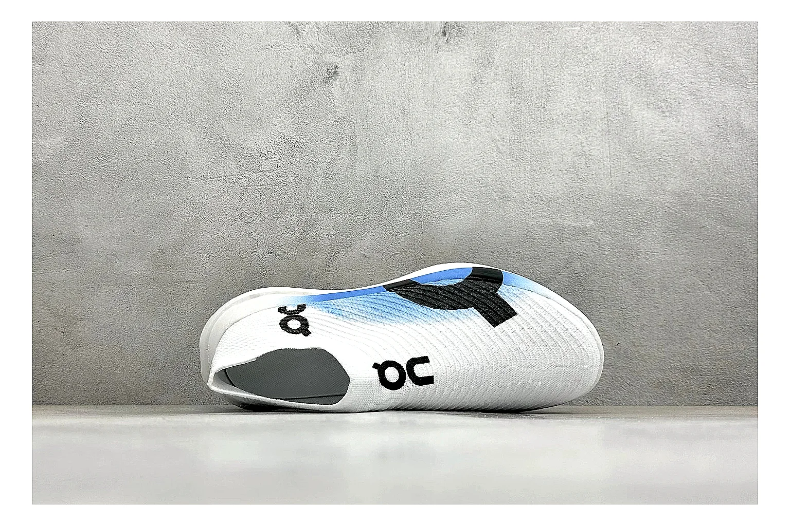 On Cloudboom White Blue spreadsheet record photo showing white performance mesh, blue gradient accents, slim racing profile, and segmented CloudTec sole thumbnail 2