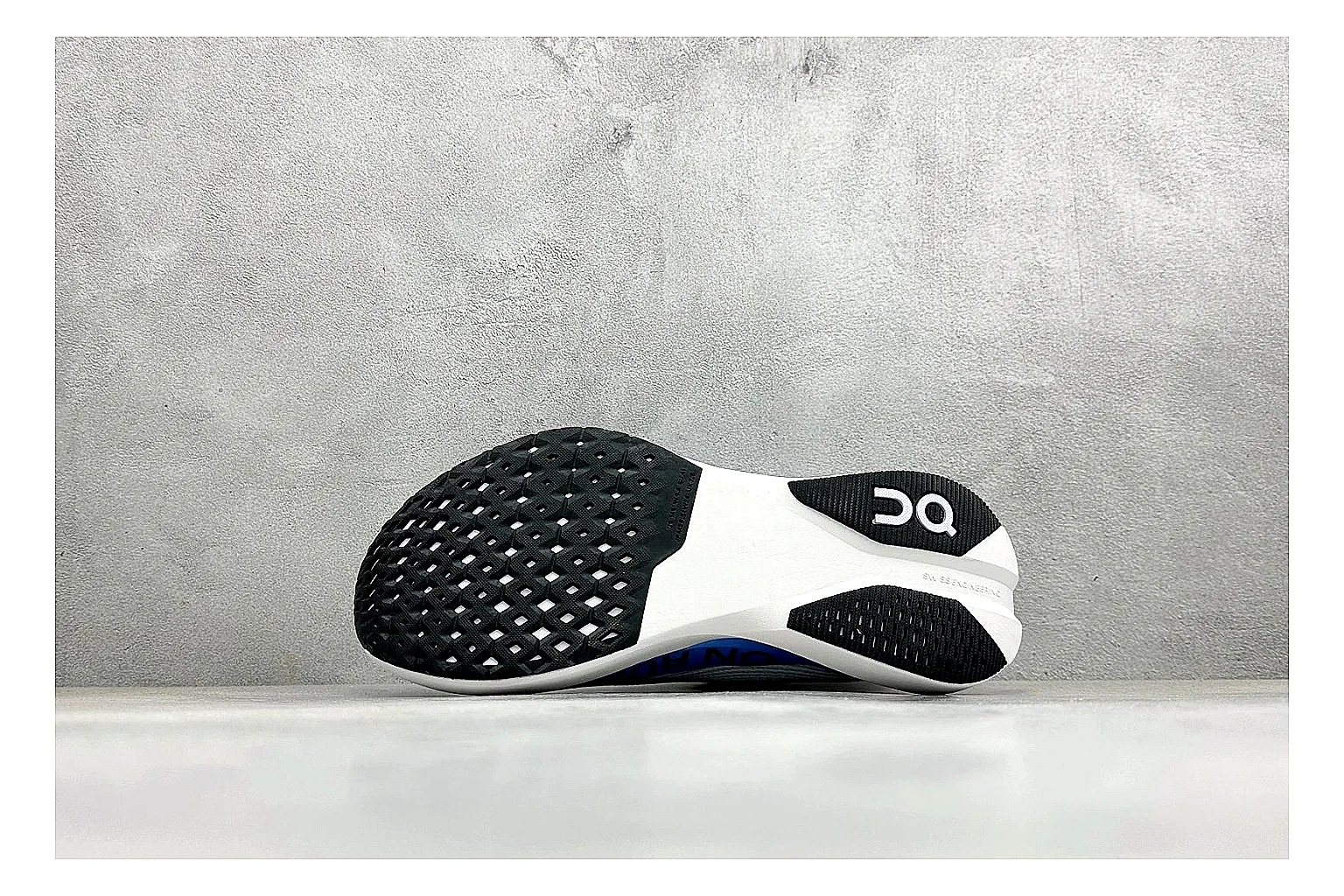 On Cloudboom White Blue spreadsheet record photo showing white performance mesh, blue gradient accents, slim racing profile, and segmented CloudTec sole