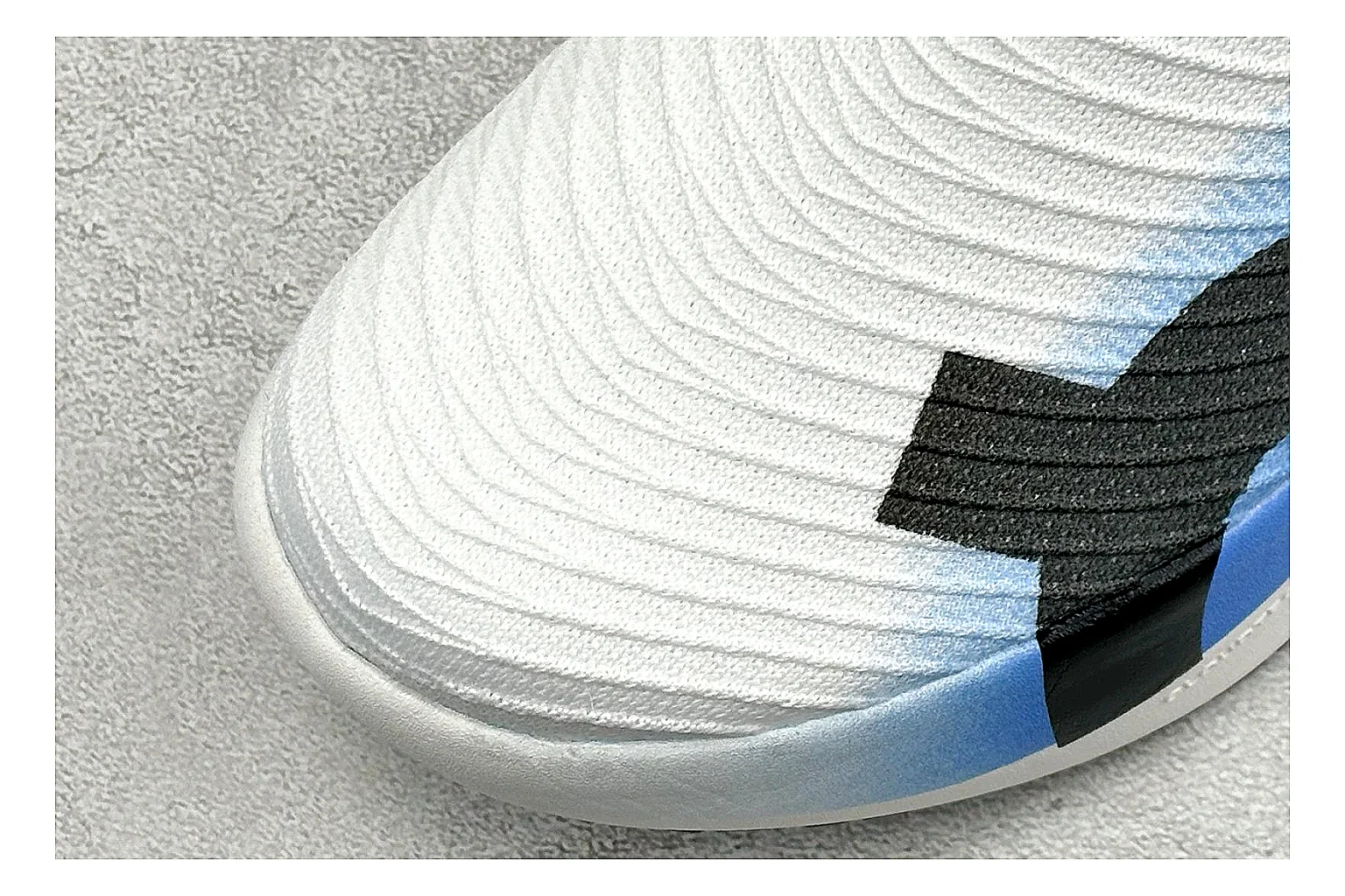 On Cloudboom White Blue spreadsheet record photo showing white performance mesh, blue gradient accents, slim racing profile, and segmented CloudTec sole thumbnail 5