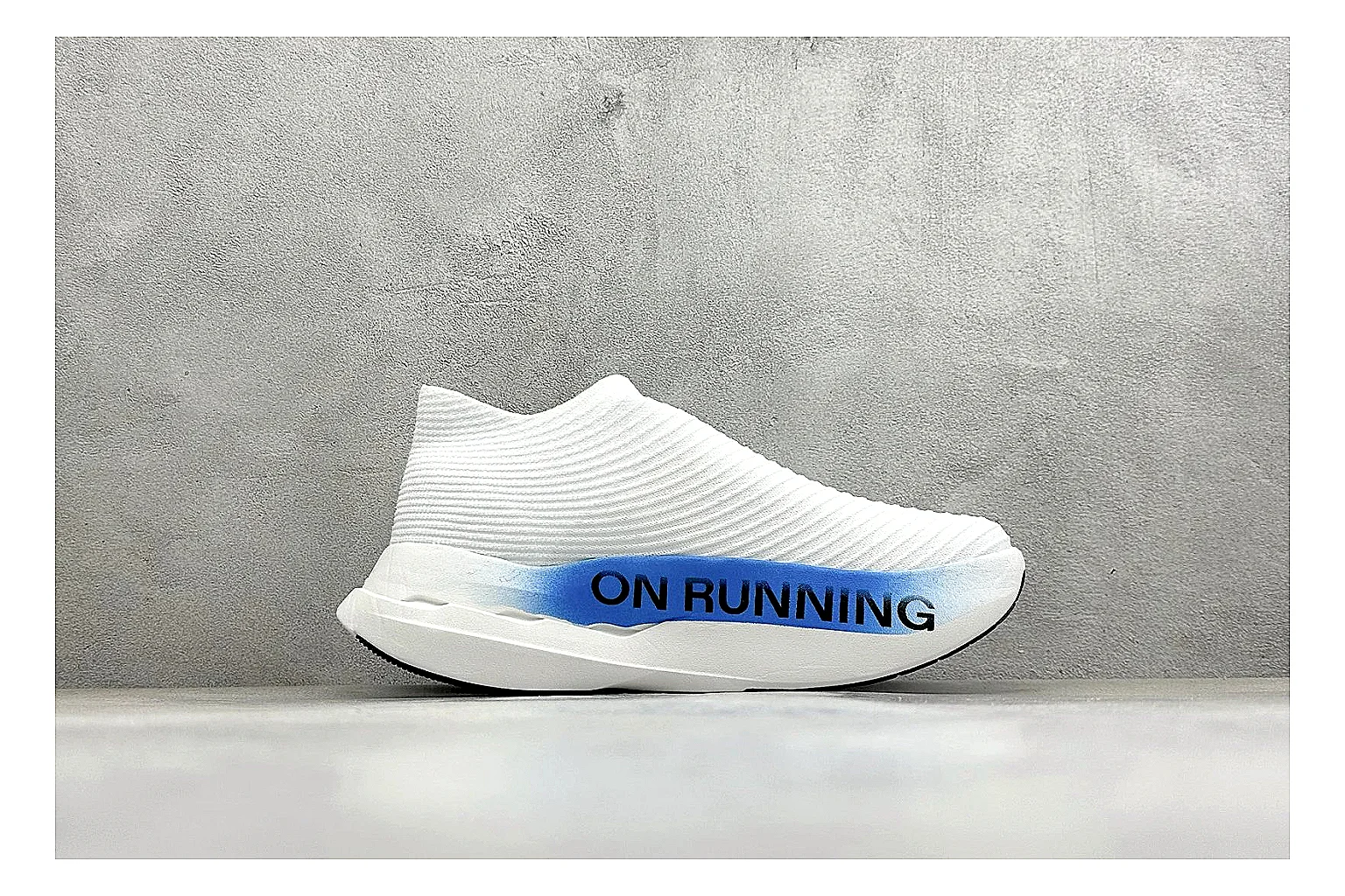 On Cloudboom White Blue spreadsheet record photo showing white performance mesh, blue gradient accents, slim racing profile, and segmented CloudTec sole thumbnail 6