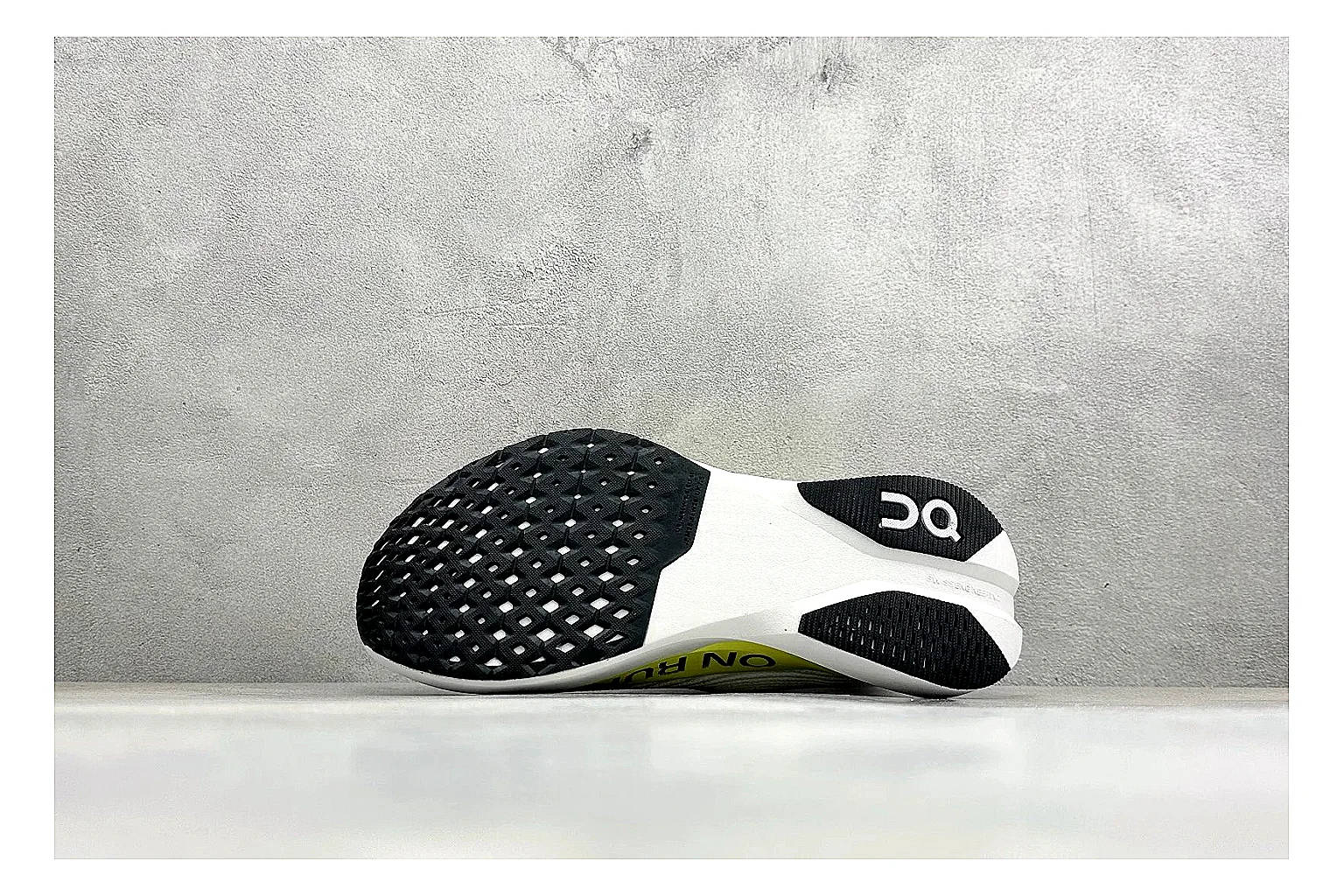 On Cloudboom White Lime spreadsheet record photo showing white performance mesh, lime gradient accents, slim racing profile, and segmented CloudTec sole