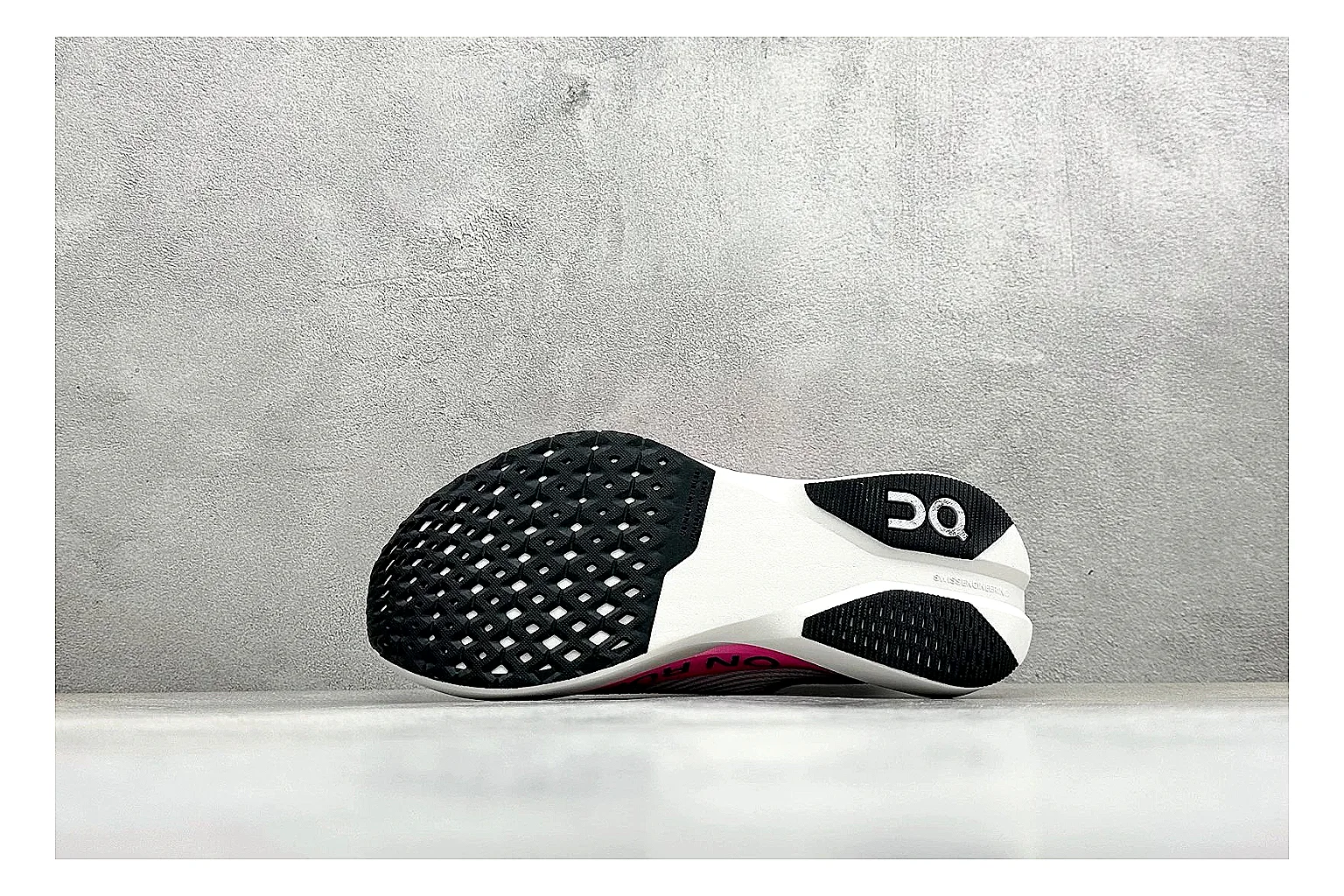 On Cloudboom White Pink spreadsheet record photo showing white running mesh, pink gradient accents, low racing shape, and segmented CloudTec sole