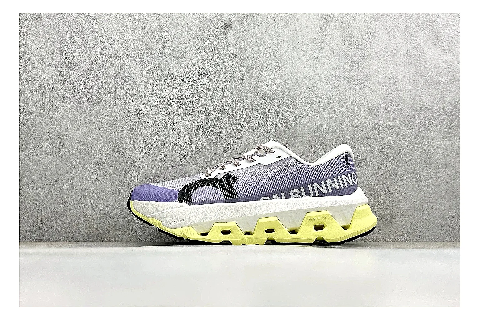 On Cloudmonster Lavender Lime spreadsheet record photo showing lavender runner upper, lime accent hits, oversized CloudTec pod sole, and soft technical color mix