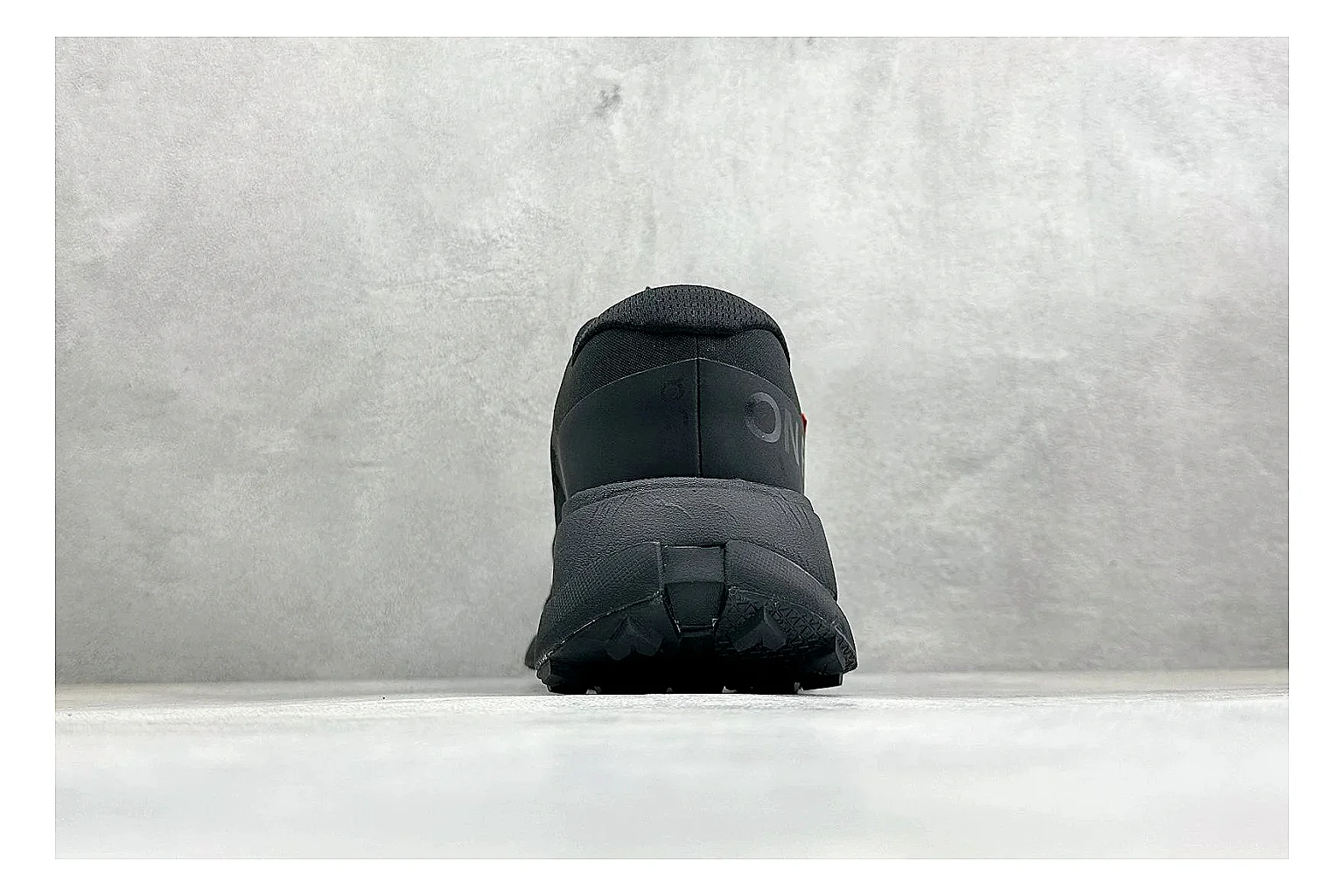 On Cloudmonster Triple Black spreadsheet record photo showing triple black mesh upper, oversized CloudTec sole pods, tonal laces, and rounded runner shape thumbnail 3