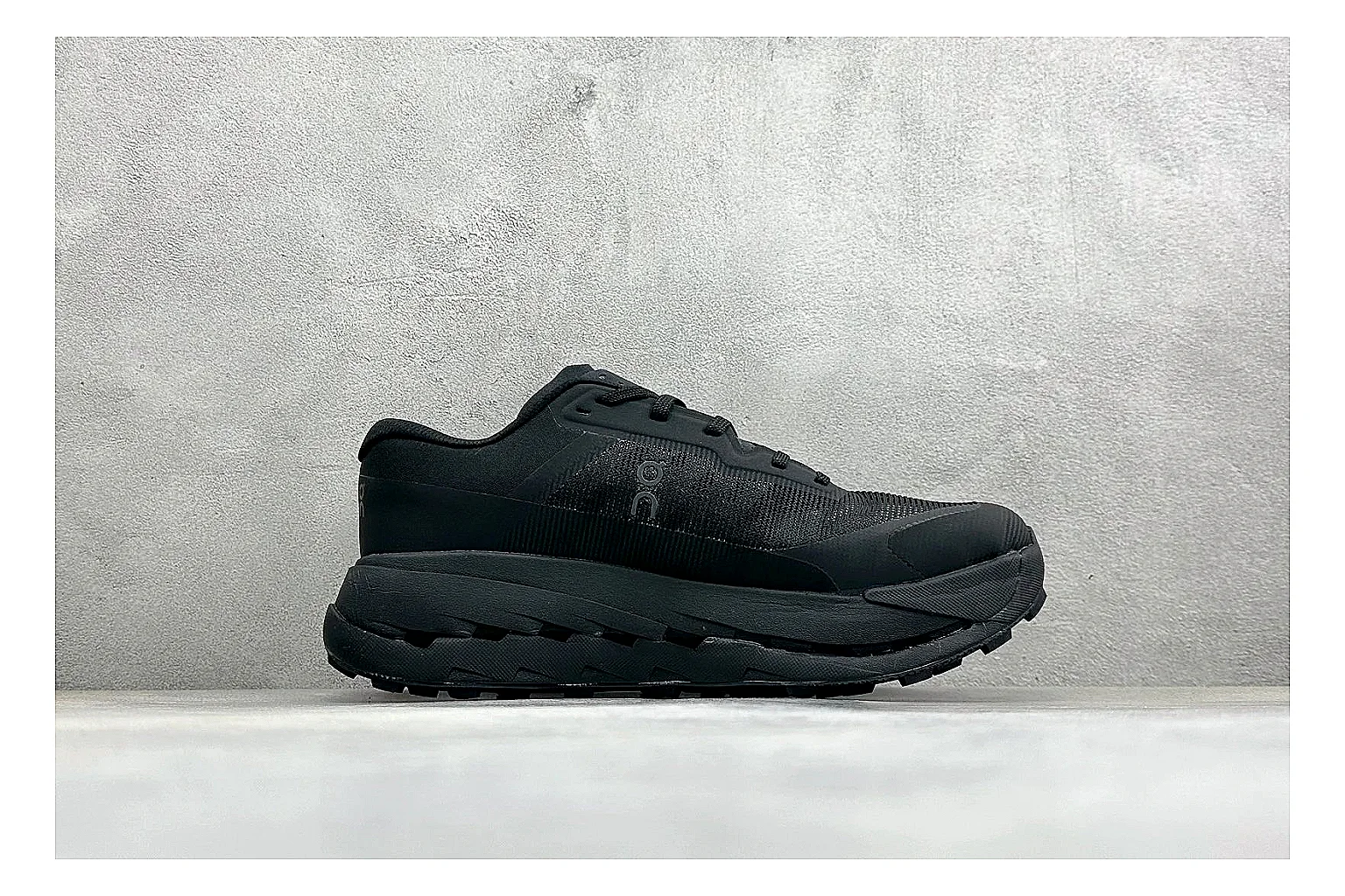 On Cloudmonster Triple Black spreadsheet record photo showing triple black mesh upper, oversized CloudTec sole pods, tonal laces, and rounded runner shape thumbnail 6