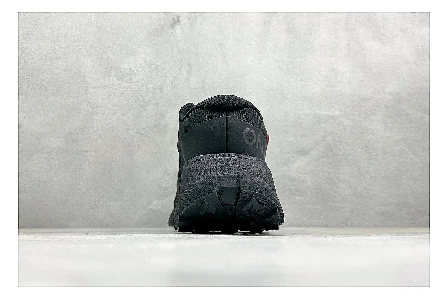 On Cloudmonster Triple Black spreadsheet record photo showing triple black running upper, oversized CloudTec pod sole, tonal laces, and rounded performance shape thumbnail 3