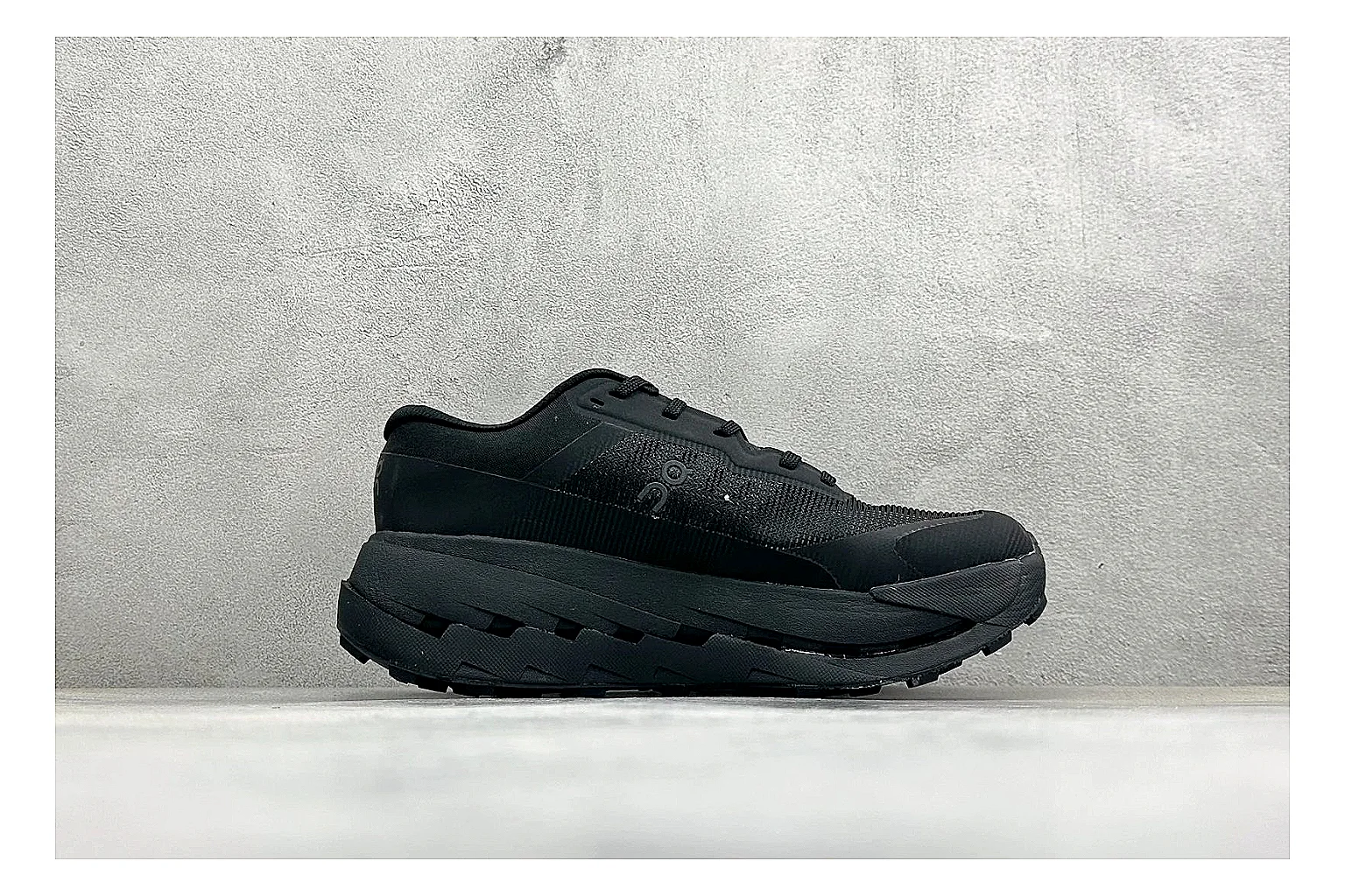 On Cloudmonster Triple Black spreadsheet record photo showing triple black running upper, oversized CloudTec pod sole, tonal laces, and rounded performance shape thumbnail 6