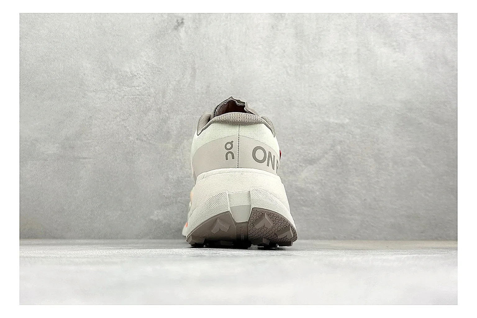 On Cloudmonster White Orange spreadsheet record photo showing white running mesh, orange accent hits, oversized CloudTec sole pods, and a rounded runner silhouette thumbnail 3