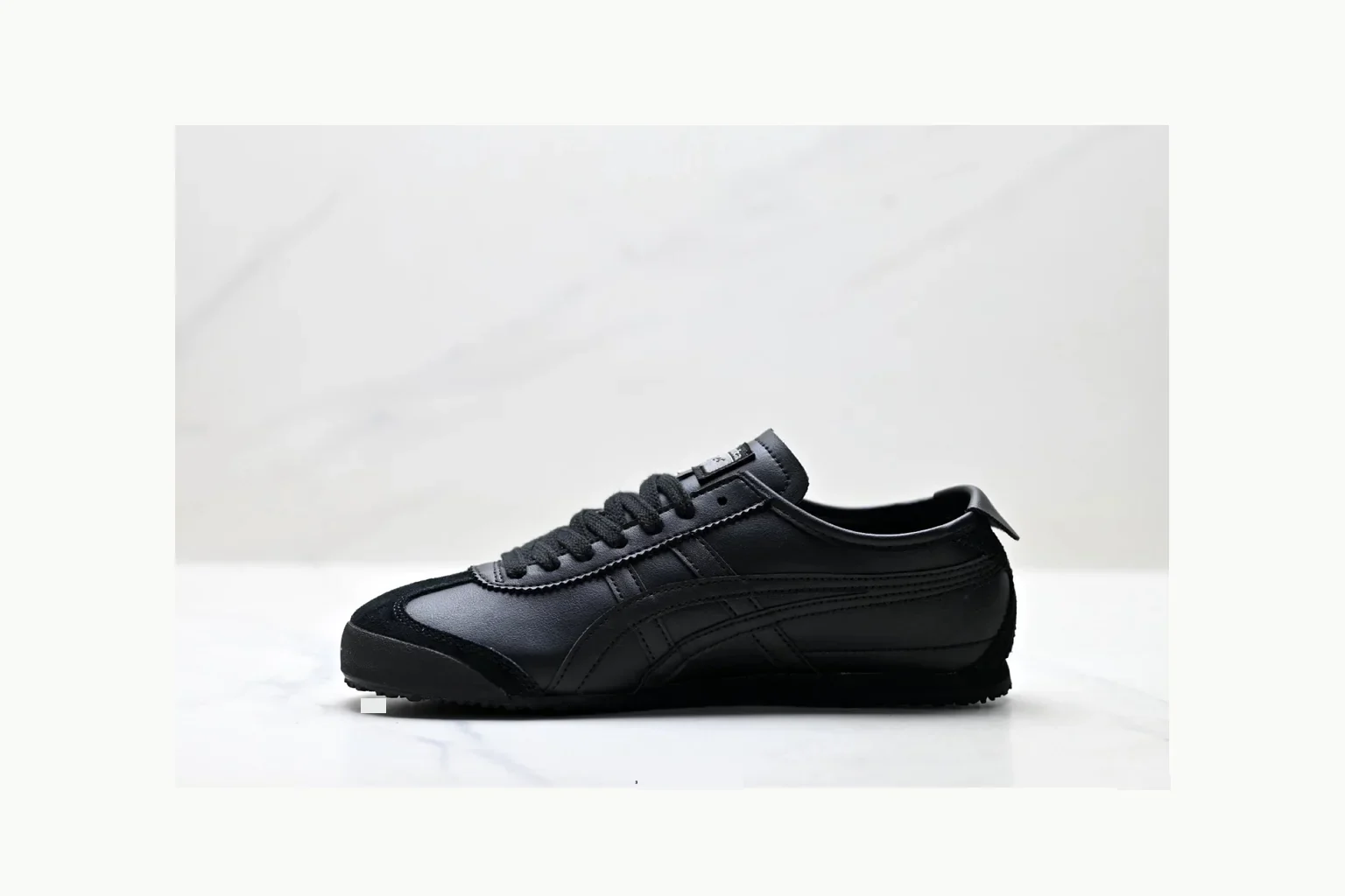 Onitsuka Tiger Black Leather Sneaker Sheetbase record image with black black leather retro low-top with leather upper and low top shape