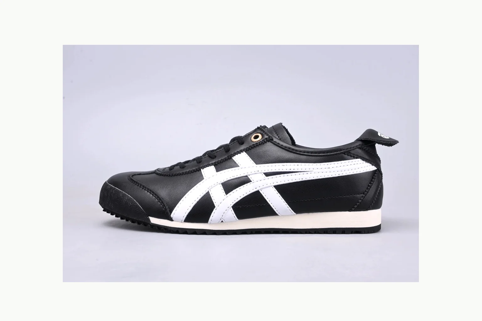 Onitsuka Tiger Black White Sneaker Sheetbase record image with white black onitsuka tiger with mixed upper and low top shape