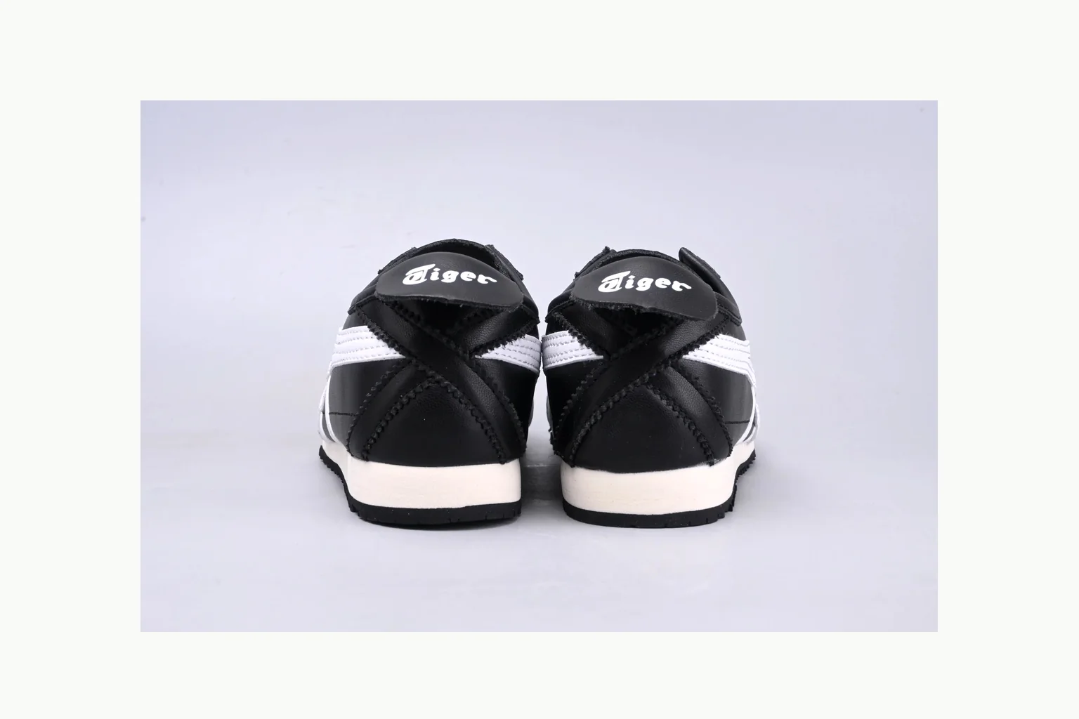 Onitsuka Tiger Black White Sneaker Sheetbase record image with white black onitsuka tiger with mixed upper and low top shape thumbnail 3