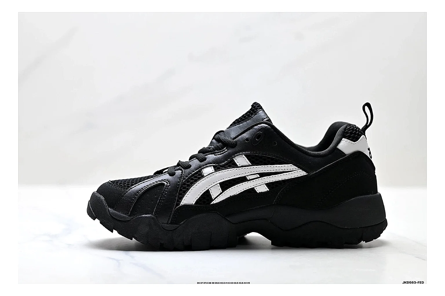 Onitsuka Tiger Gel-Tru Black White Sneakers spreadsheet record image with black white trail runner sneakers with mesh-leather texture, side-profile shape, upper panel lines, and outsole detail thumbnail 6