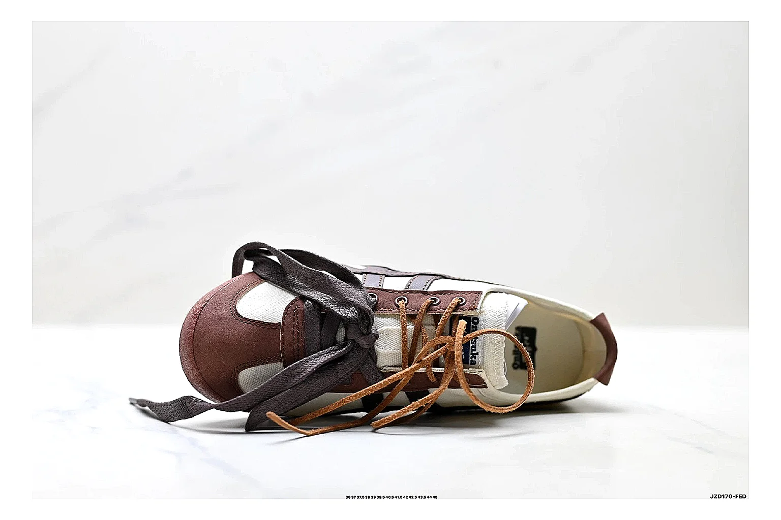 Onitsuka Tiger Mexico 66 Brown Cream Sneakers spreadsheet record image with brown cream low-top sneakers with leather texture, side-profile shape, upper panel lines, and outsole detail thumbnail 2