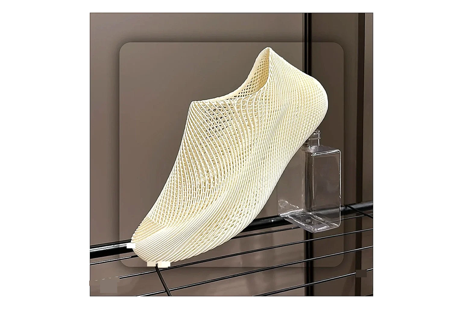 Other 4D Printed Cream Slip-On Sneakers spreadsheet record photo showing cream open-grid upper, seamless slip-on profile, sculpted sole, and soft futuristic casual shape