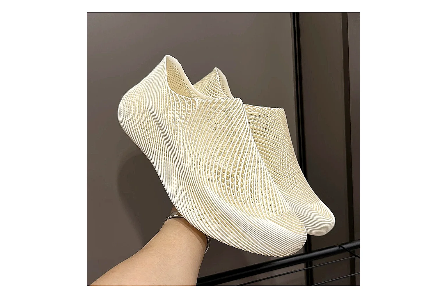 Other 4D Printed Cream Slip-On Sneakers spreadsheet record photo showing cream open-grid upper, seamless slip-on profile, sculpted sole, and soft futuristic casual shape thumbnail 2