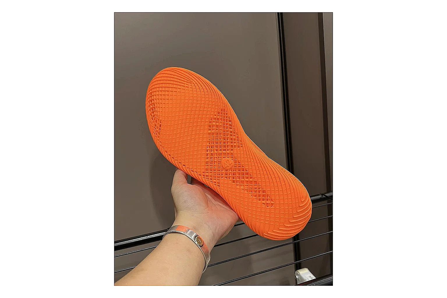 Other 4D Printed Orange Slip-On Sneakers spreadsheet record photo showing orange open-grid upper, seamless slip-on shape, sculpted sole, and futuristic lightweight profile thumbnail 5