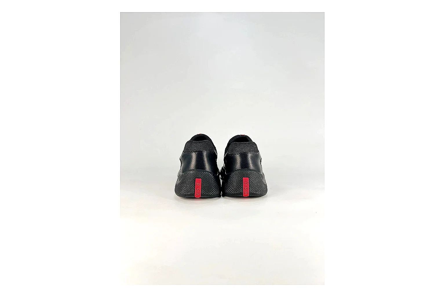Black Runner Black Sneaker spreadsheet record photo showing black mesh runner upper, tonal overlays, modern running shape, and dark cushioned sole