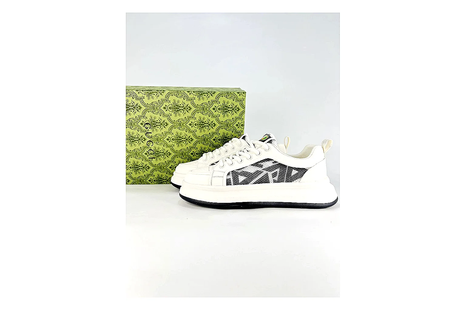 Low Runner White Black Sneaker spreadsheet record photo showing white black synthetic low-top upper, minimal runner shape, clean panels, and casual sole