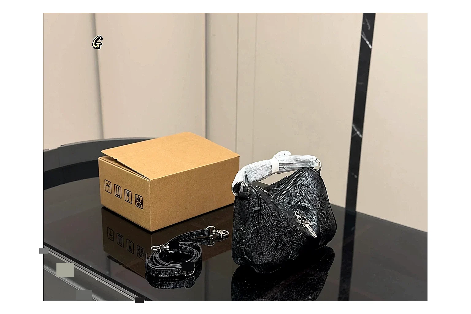 Mini Top Handle Black Bag spreadsheet record photo showing black leather compact bag body, structured handle, clean top-handle shape, and simple hardware