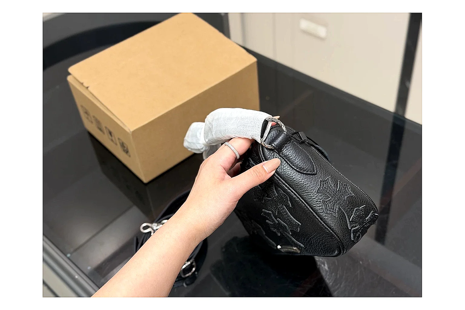 Mini Top Handle Black Bag spreadsheet record photo showing black leather compact bag body, structured handle, clean top-handle shape, and simple hardware thumbnail 5