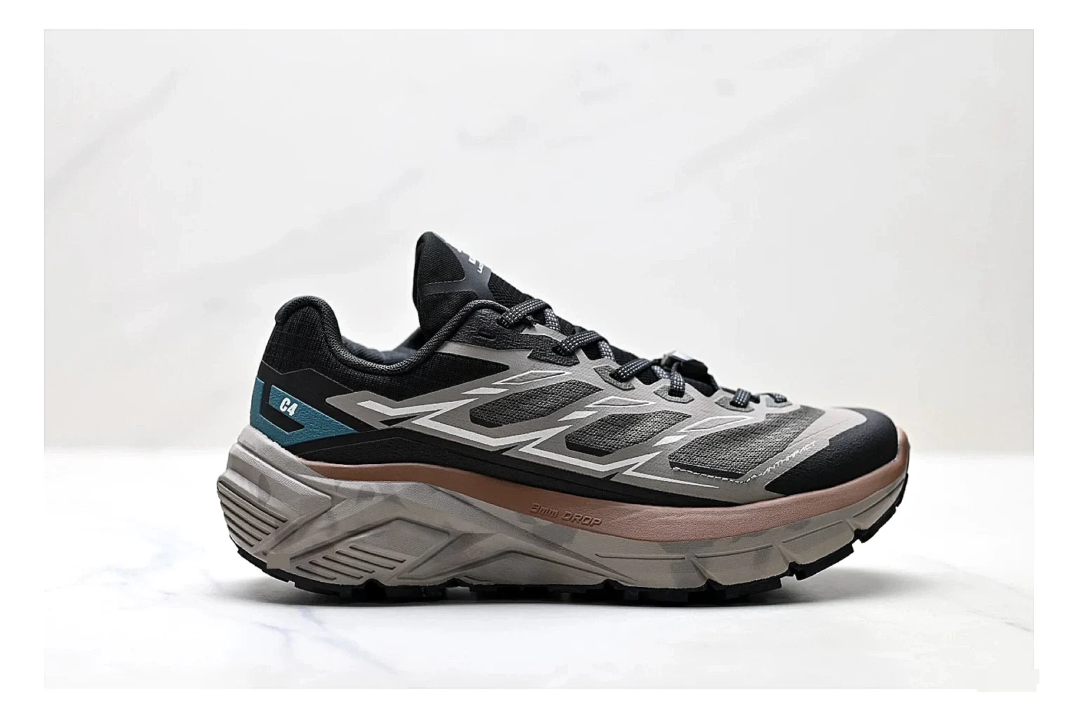 Trail Runner Black Teal Sneaker spreadsheet record photo showing black mesh runner upper, teal accent details, rugged trail profile, and traction sole
