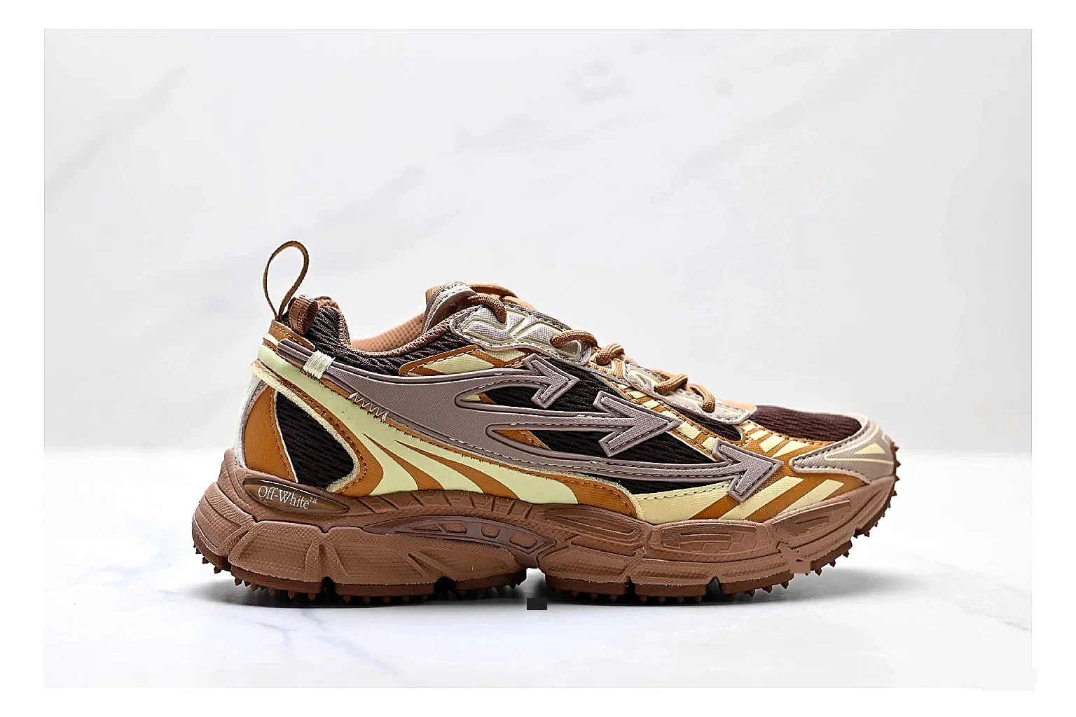Trail Runner Brown Gold Sneaker spreadsheet record photo showing brown gold mesh-suede runner upper, rugged trail profile, protective overlays, and traction sole