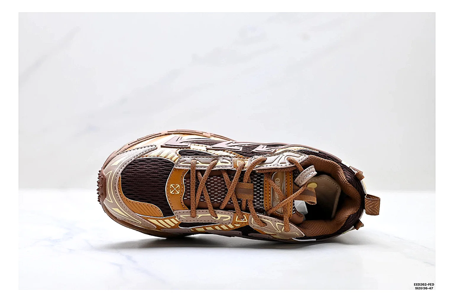 Trail Runner Brown Gold Sneaker spreadsheet record photo showing brown gold mesh-suede runner upper, rugged trail profile, protective overlays, and traction sole thumbnail 6