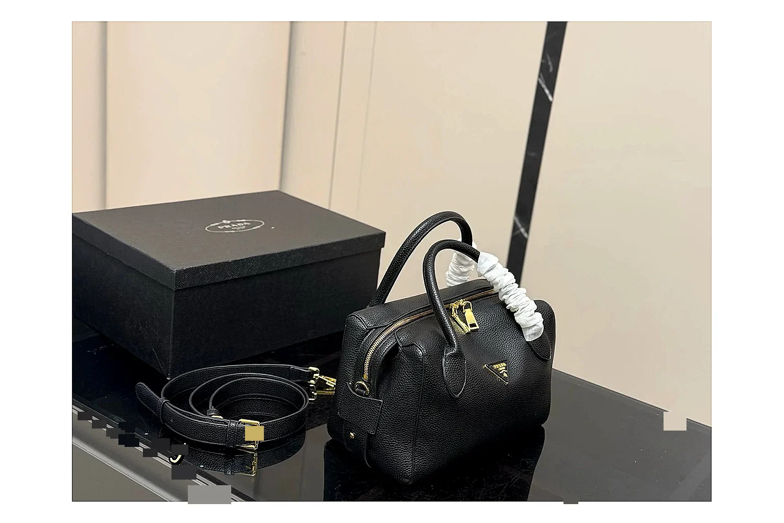Prada Mini Top Handle Black spreadsheet record photo showing black leather mini bag body, structured top handle, compact silhouette, and clean metal hardware