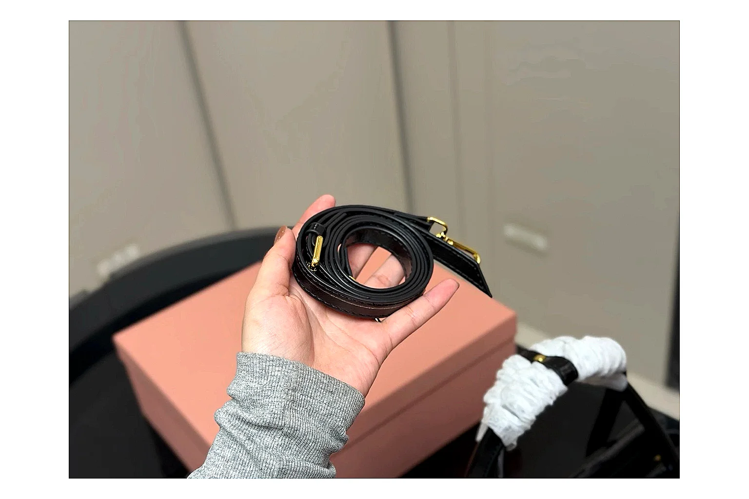 Prada Mini Top Handle Black spreadsheet record photo showing black leather mini bag body, structured top handle, compact luxury shape, and clean hardware details thumbnail 3