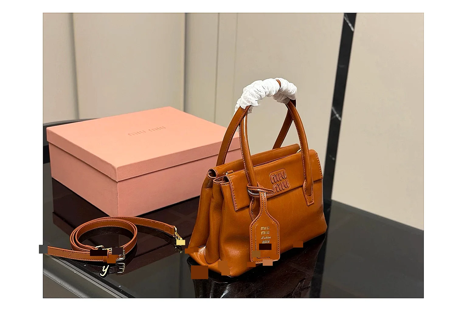 Prada Mini Top Handle Orange Brown spreadsheet record photo showing orange brown leather mini bag body, structured top handle, compact shape, and clean hardware details