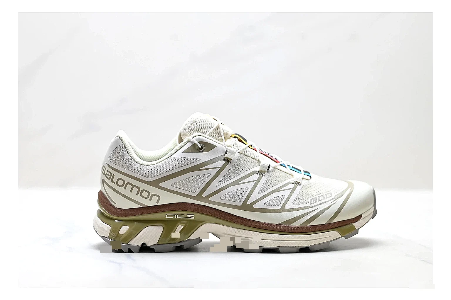 Salomon Xt Runner White Gold spreadsheet record photo showing white mesh trail-runner upper, gold accents, speed-lace style structure, and rugged sole
