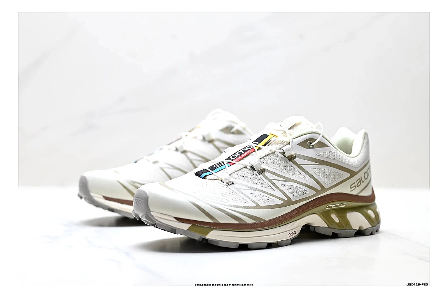 Salomon Xt Runner White Gold spreadsheet record photo showing white mesh trail-runner upper, gold accents, speed-lace style structure, and rugged sole