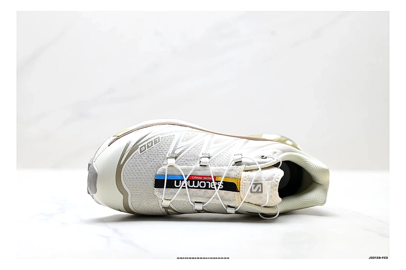 Salomon Xt Runner White Gold spreadsheet record photo showing white mesh trail-runner upper, gold accents, speed-lace style structure, and rugged sole thumbnail 6