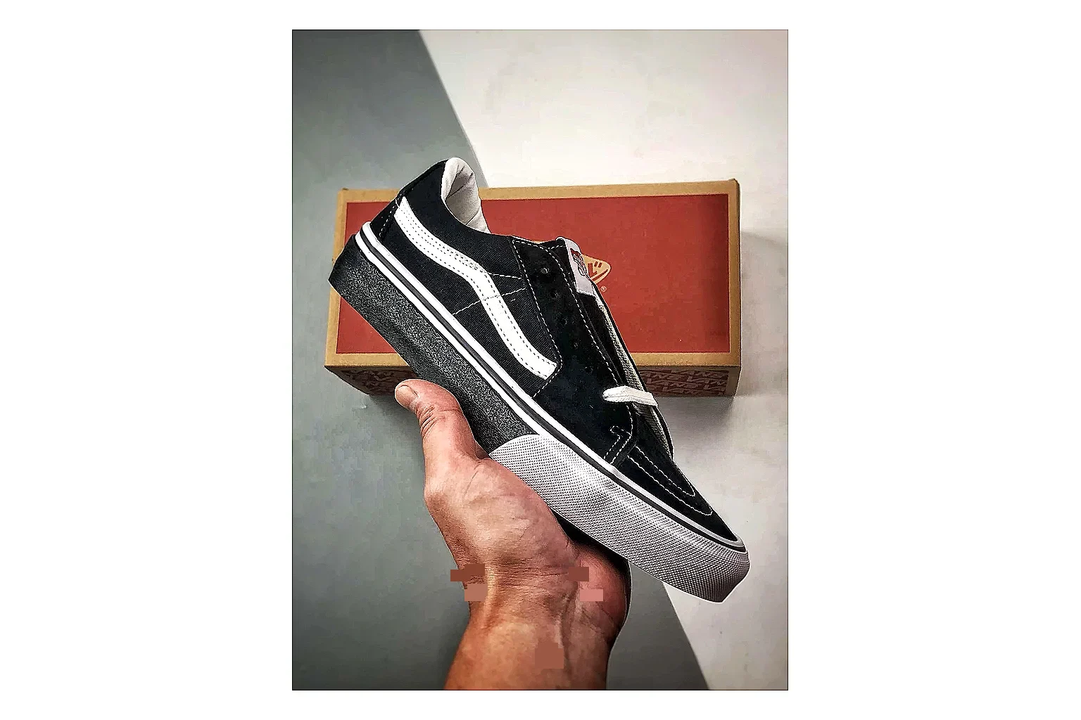 Vans Old Skool Black White spreadsheet record photo showing black canvas-suede low-top upper, white side stripe, padded collar, and classic vulcanized skate sole